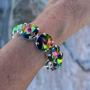 A stretch statement bracelet with medium vitrail Swarovski crystal